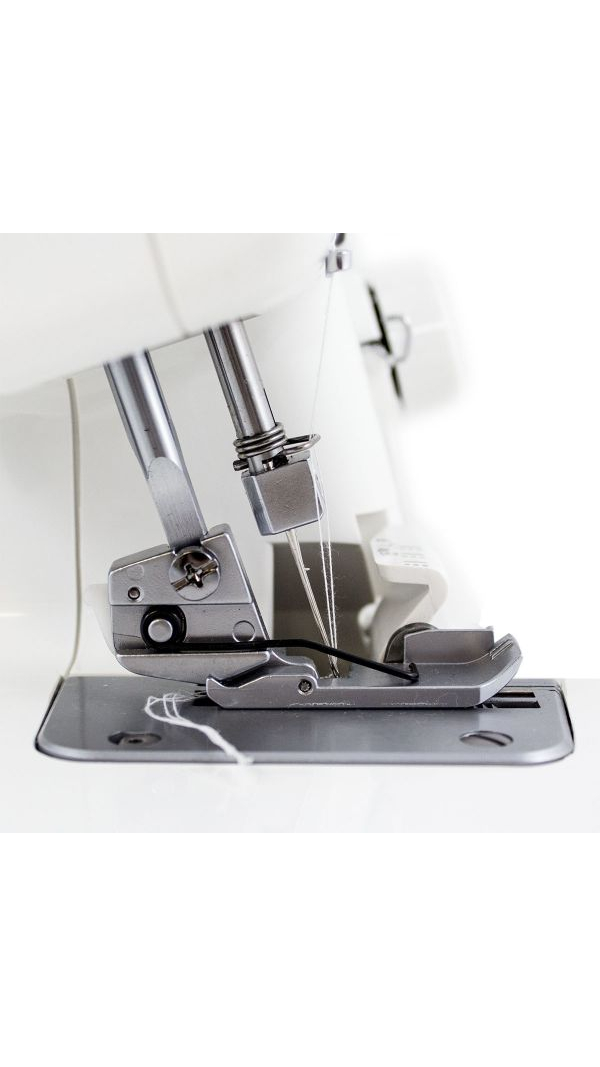 Оверлок Janome 210d